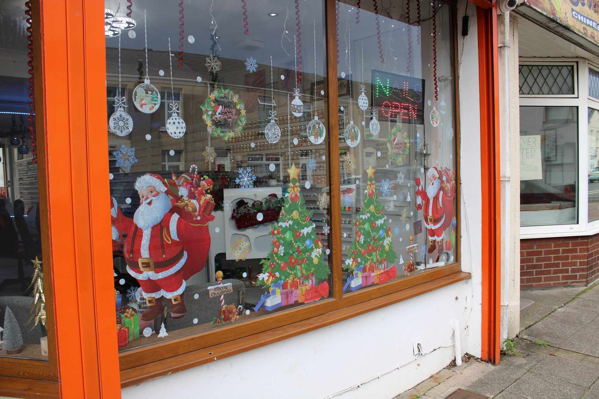 Texas Nails Christmas shop window, santa, decorations and christmas trees