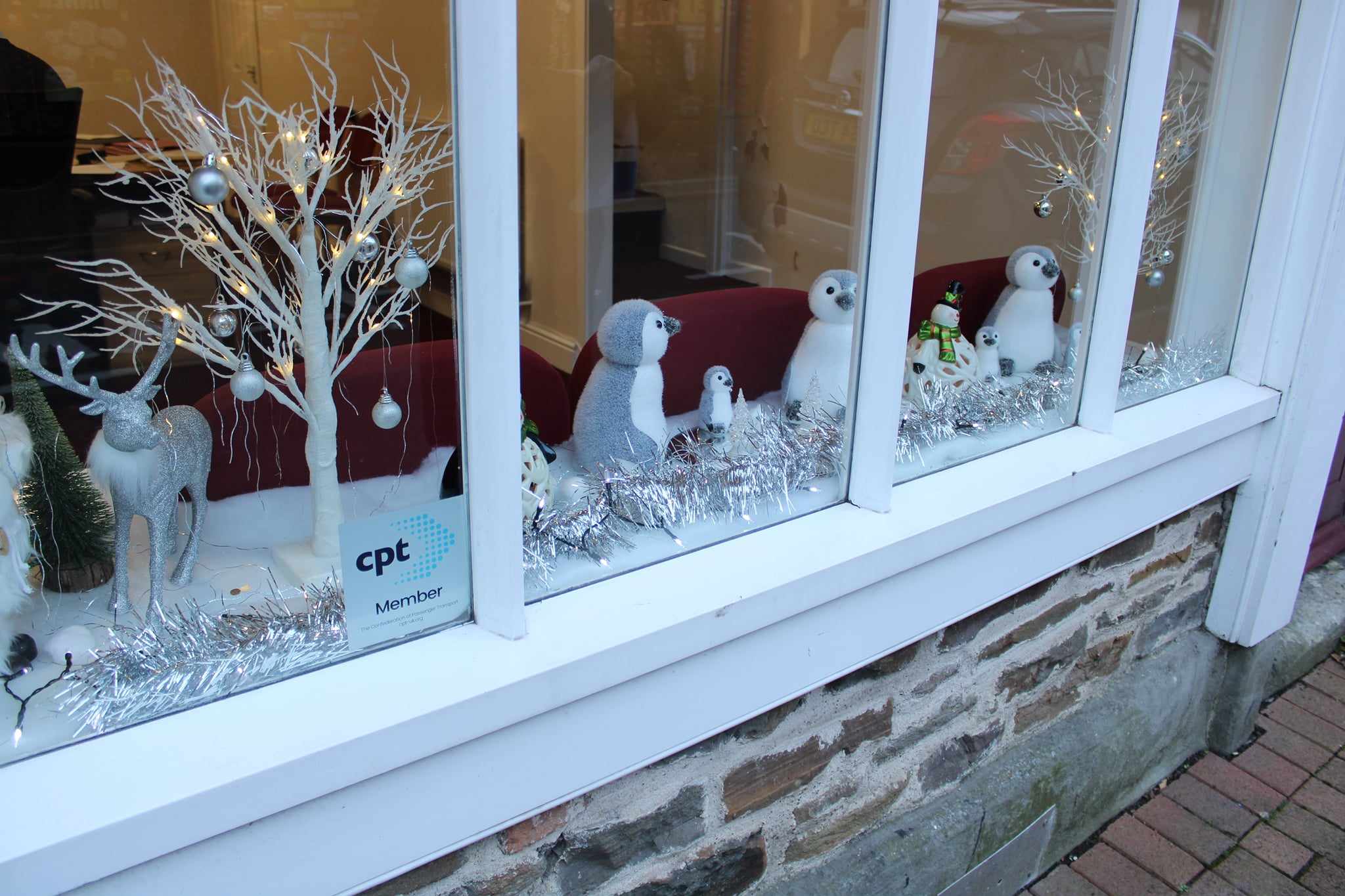 DJ Thomas Christmas Shop Window, penguins and reindeer