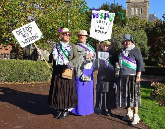 Suffragette reenactors in Victoria Gardens